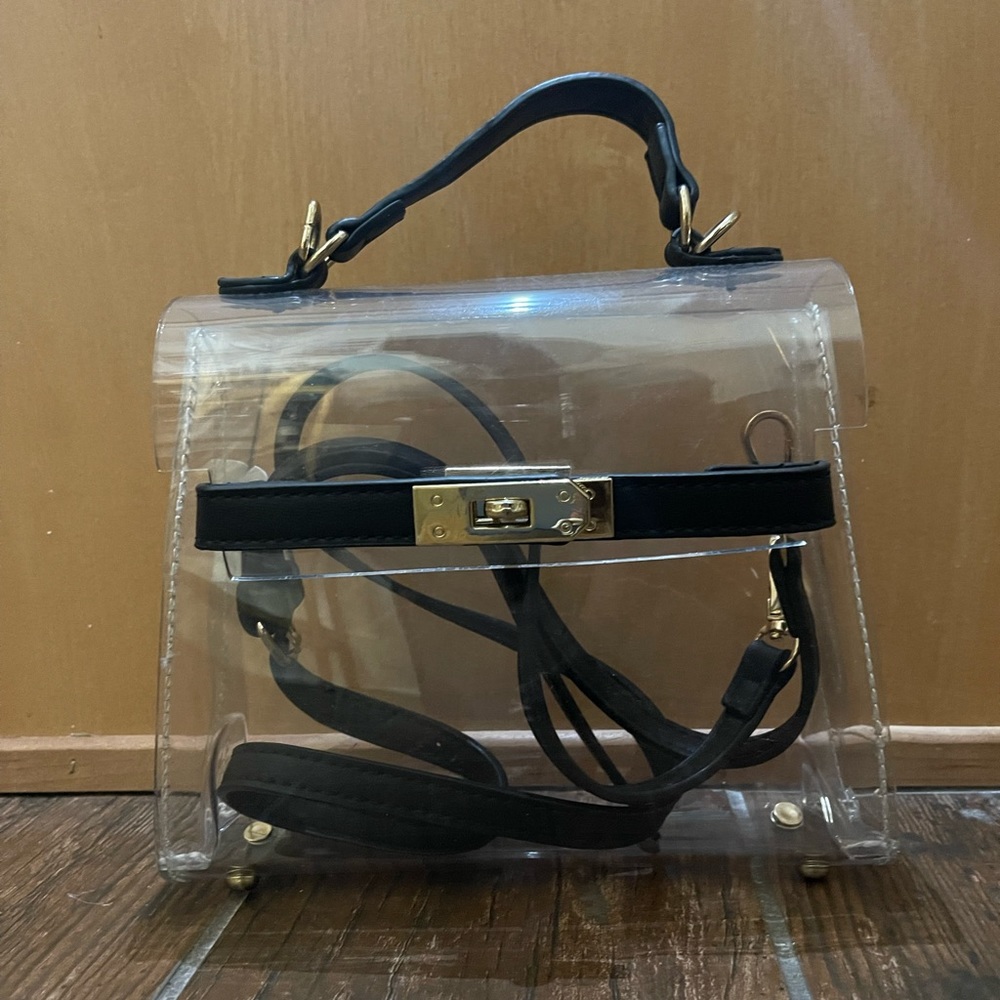 Clear and black clear top handle purse with removable black strap